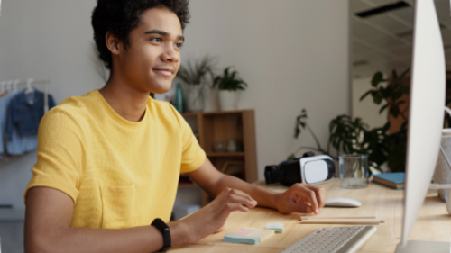 Man in front of a computer