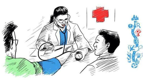 A healthcare professional in a blue coat is examining a patient lying on a bed. She is using a stethoscope to listen to his heart. Another individual, possibly a medical assistant, is observing the procedure. A red cross symbol is visible in the background, indicating a medical setting.