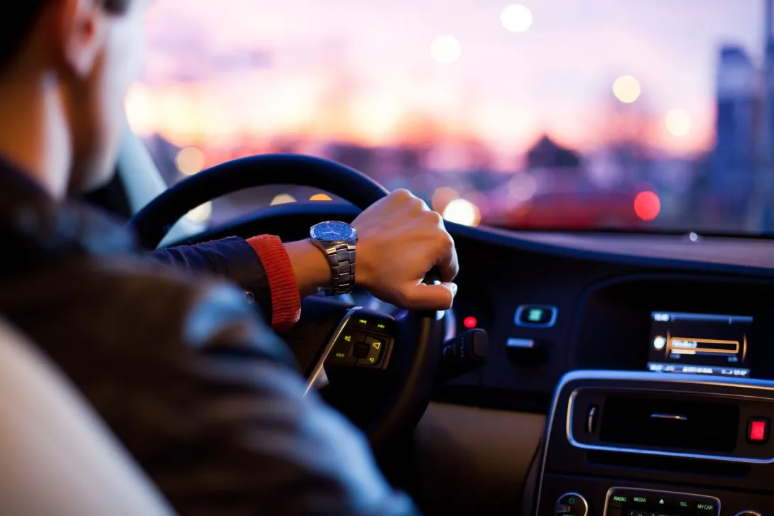 A person driving a vehicle