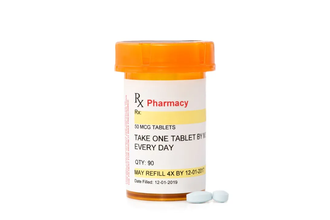 A prescription bottle with instructions, dosage, and quantity across the label
